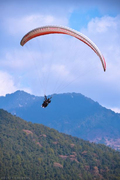 A girl paragliding at Billing, Himachal Pradesh