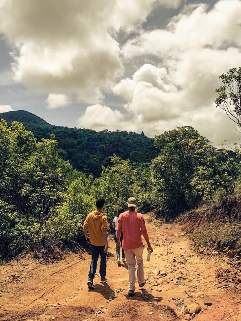 Two-Men-Walking-on-Barren-Land-in-Sakleshpur